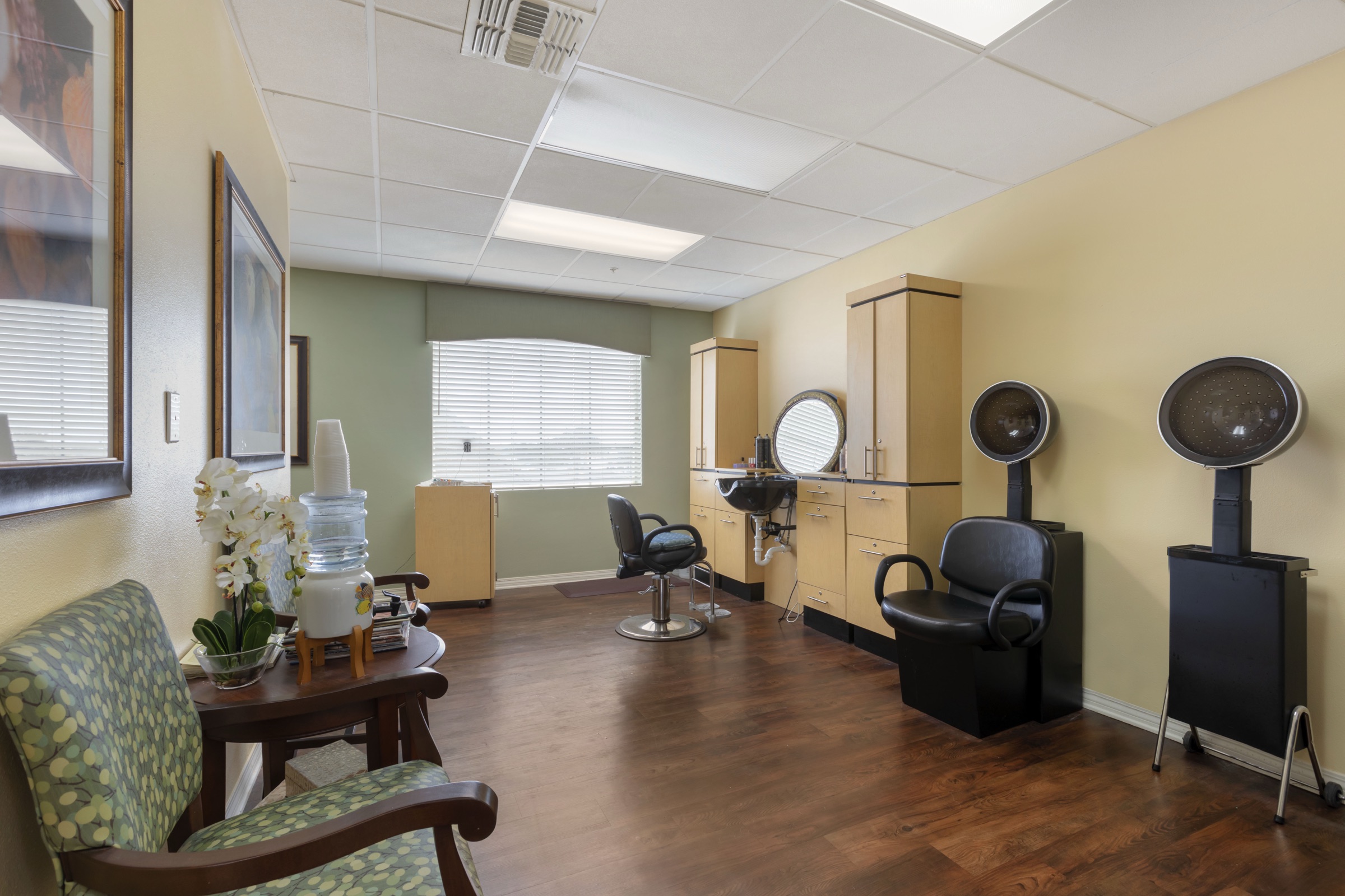 The salon, with a styling chair and mirrors